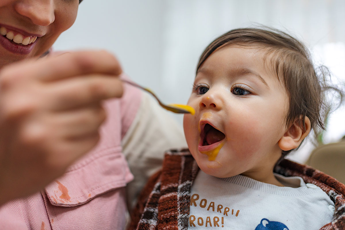 Child Tasting Pumpkin Food